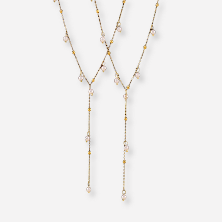 Ania™ | Klassieke Parelketting" can be rewritten as "Ania™ | Tijdloze Parelketting