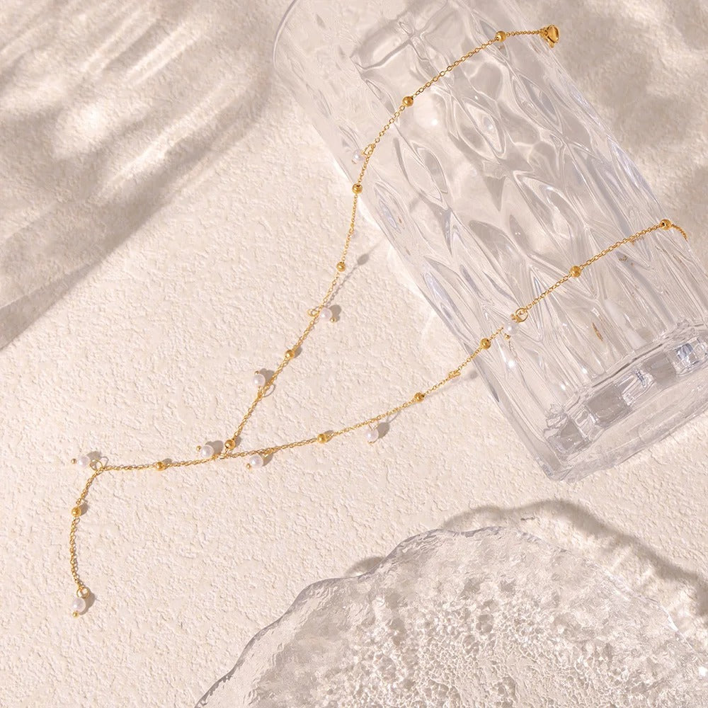 Ania™ | Klassieke Parelketting" can be rewritten as "Ania™ | Tijdloze Parelketting